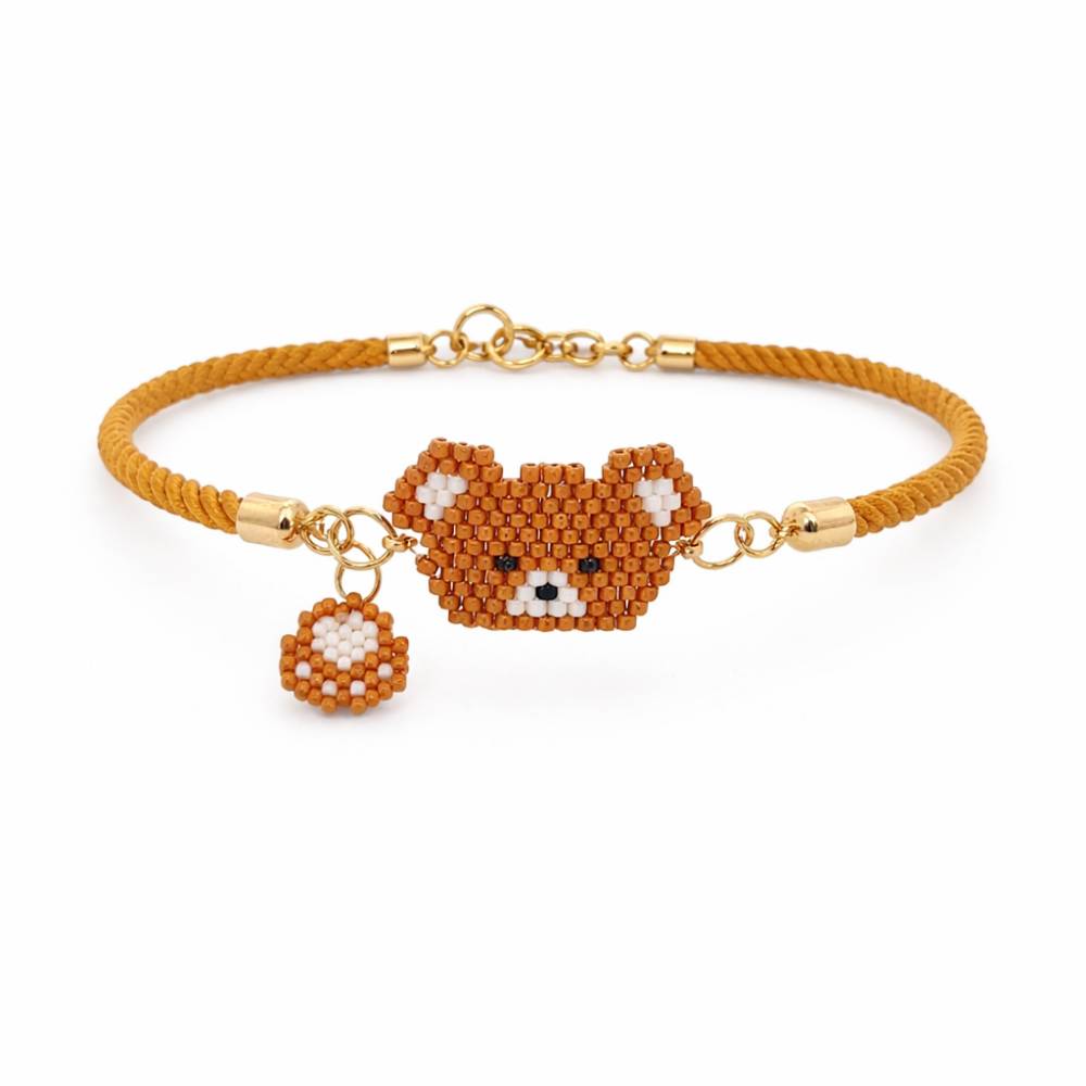 دستبند منجوقی دخترانه تدی عسلی طرح خرس فانتزی با قفل کشویی و بند عسلی از برند تک‌آرینا